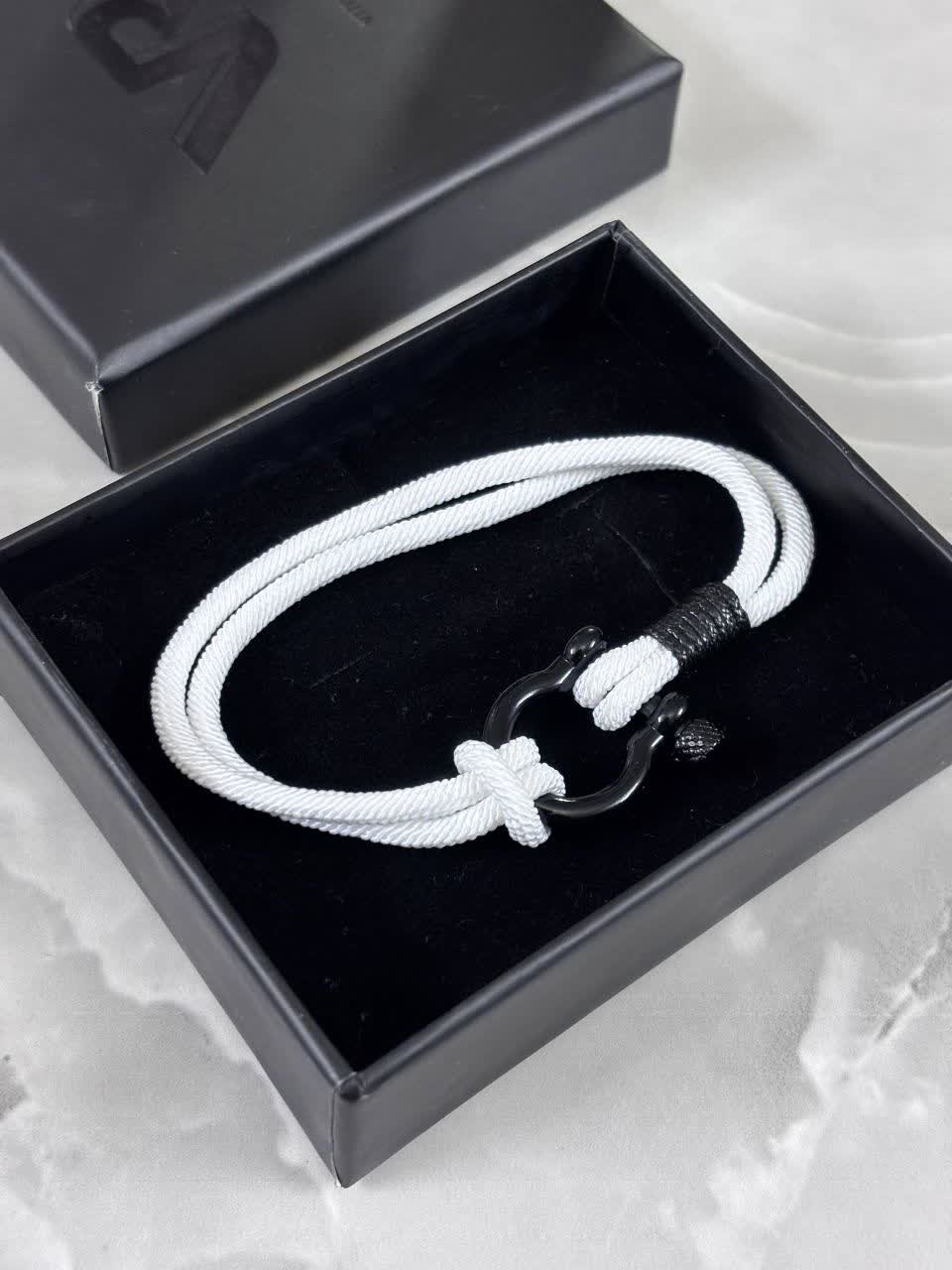 photo21565673156 دستبند کنفی سفید - Image 1